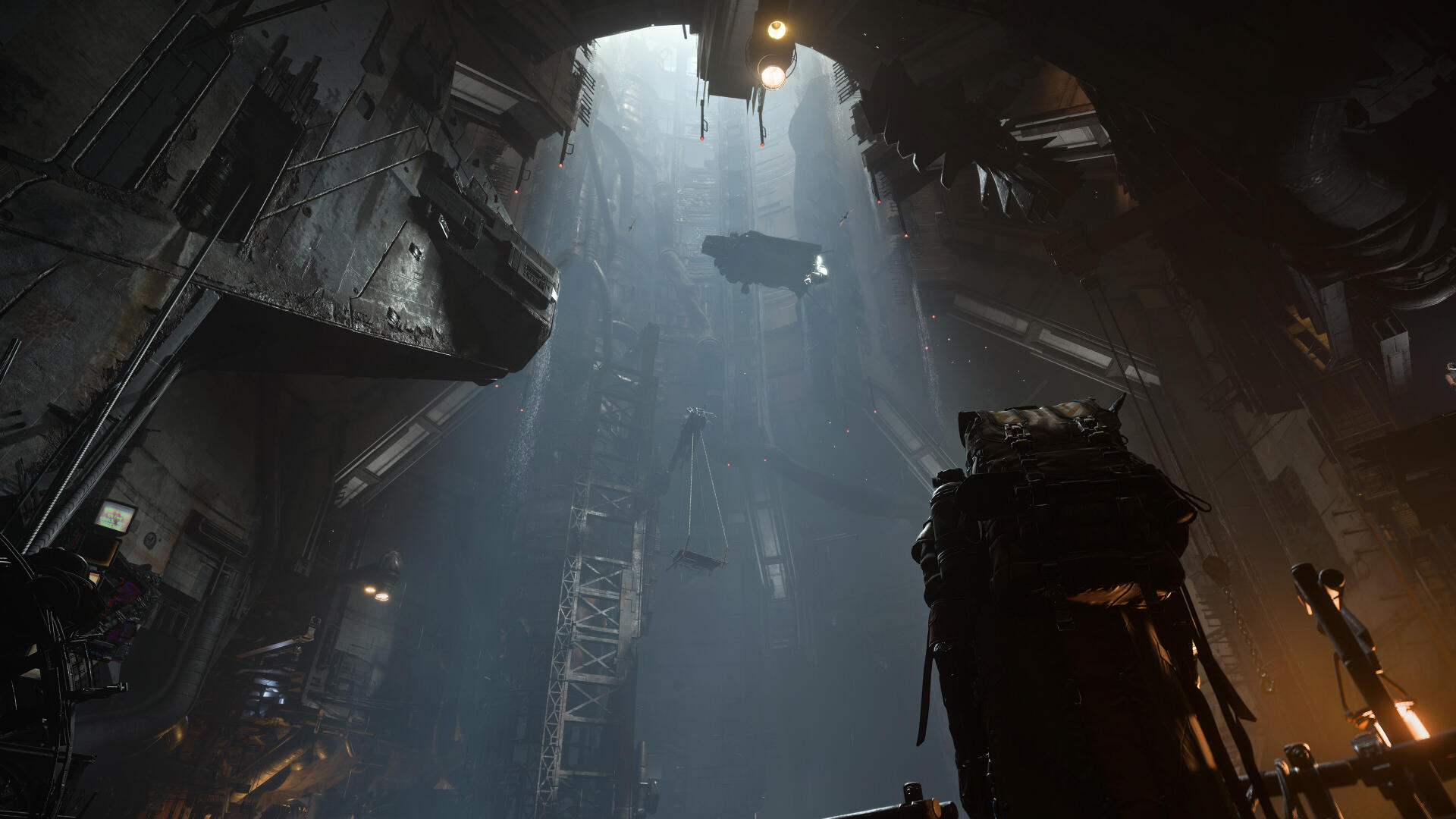 4K Ultra HD Star Citizen and Squadron 42 PC wallpaper of a shadowy industrial sci-fi factory lit by beams from above.