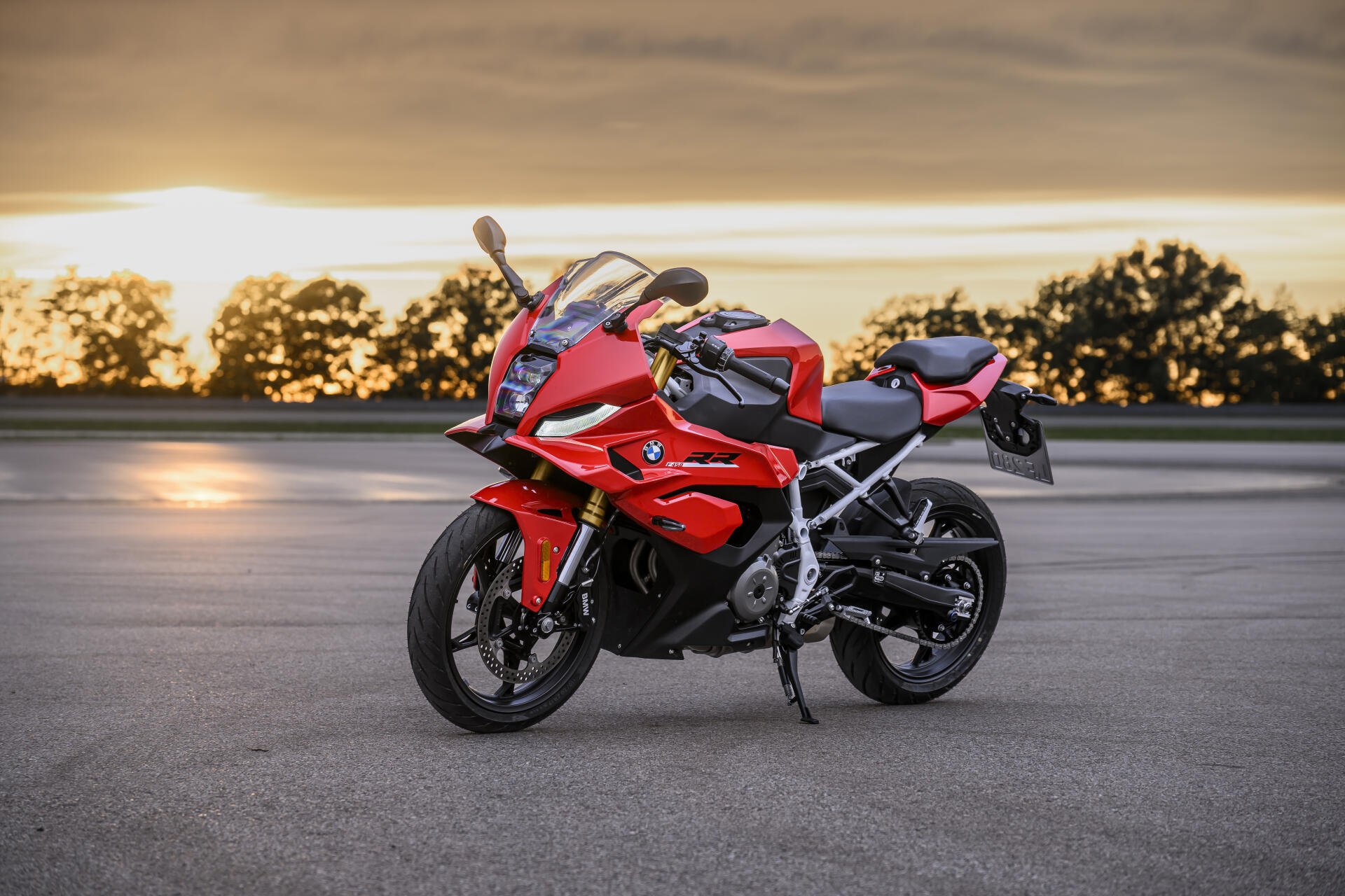 BMW F 450 RR sportbike by BMW Motorrad on a sunlit road, 8K Ultra HD desktop wallpaper.