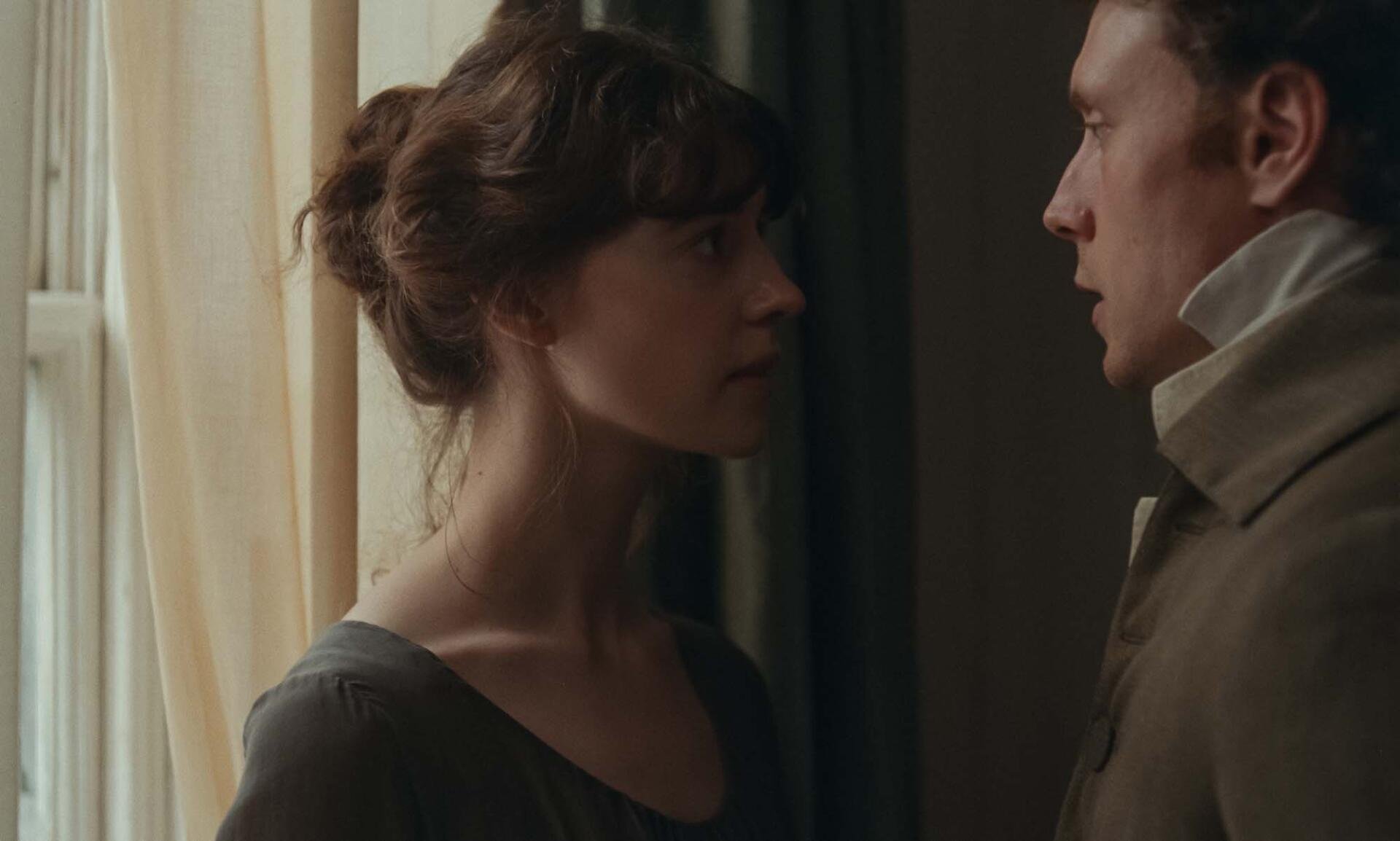 Daisy Edgar-Jones and a man face each other in a period drama scene from Sense and Sensibility, HD desktop wallpaper.