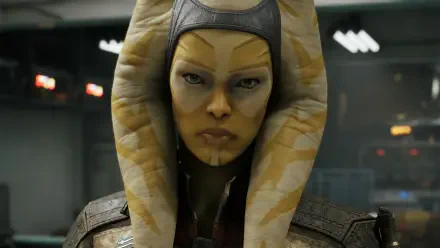 HD PC desktop wallpaper: close-up of Runa Blask, an alien from the video game Star Wars: Zero Company, stern gaze aboard a dim starship interior.