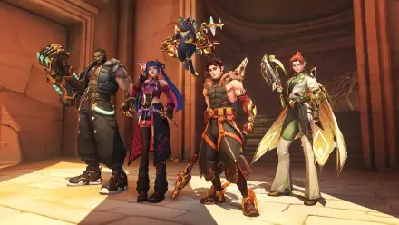 4K Ultra HD PC desktop wallpaper: Overwatch group shot of four heroes in armor and varied weapons standing in a warm-lit temple corridor, posed together as a powerful team.