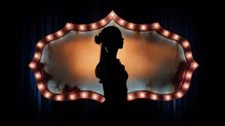 Silhouette of a woman on stage before an illuminated marquee, CLICK tag visible; 4K Ultra HD PC desktop wallpaper/background.