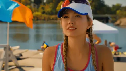 Crew girl in a cap with braided hair at a sunny beach marina, boats behind her — 4K Ultra HD PC desktop wallpaper/background, Netflix.