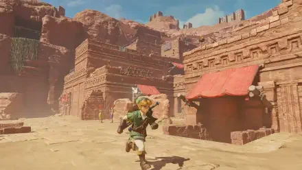 HD PC desktop wallpaper of Link from The Legend of Zelda: Ocarina of Time dashing through a sunlit desert ruin village of sandstone buildings and distant cliffs.