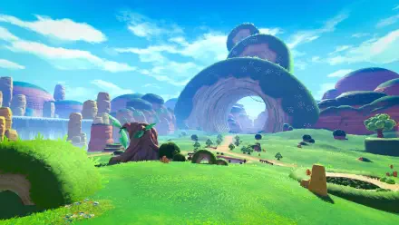 Kirby and the World Beyond landscape — Kirby in a vibrant grassland with rolling hills, arching rock formations and bright blue sky. 4K Ultra HD PC desktop wallpaper/background.