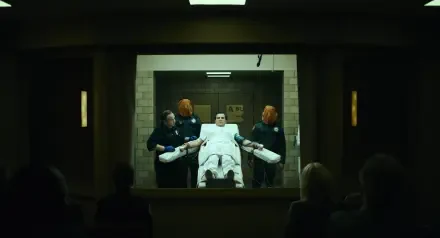 The Exorcist: Martyrs 2K Quad HD desktop wallpaper showing a patient on a stretcher in a dim hospital room.
