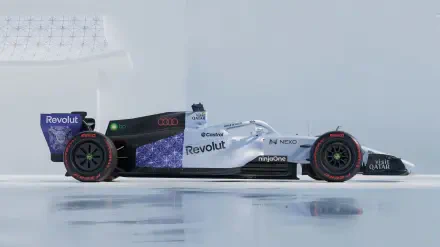 Audi R26 Formula One race car on an icy track, featured in a 4K Ultra HD PC desktop wallpaper background.