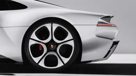 Porsche Mission S sports car rear wheel detail in a 2K Quad HD PC desktop wallpaper and background.
