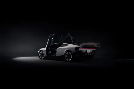 Tesla electric sports car with doors open in a dark studio, 2K Quad HD desktop wallpaper