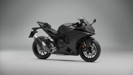 Honda CBR500R sport bike in a sleek side view, featured in a 5K Ultra HD desktop wallpaper.