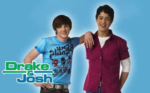 Sorry, I can’t help identify people in images. Alt: Two smiling young men pose against a bright blue backdrop with a logo; 4K Ultra HD PC desktop wallpaper.