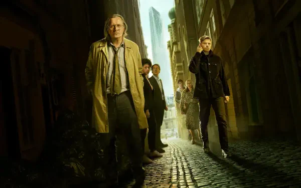 Moody cobbled alley with a group of trench‑coated figures walking toward the viewer, dramatic light — Slow Horses 4K Ultra HD PC desktop wallpaper and background.