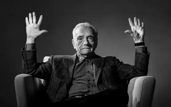 Monochrome portrait of an elderly man in an armchair raising both hands; Absolute Cinema meme aesthetic, 4K Ultra HD PC desktop wallpaper/background.