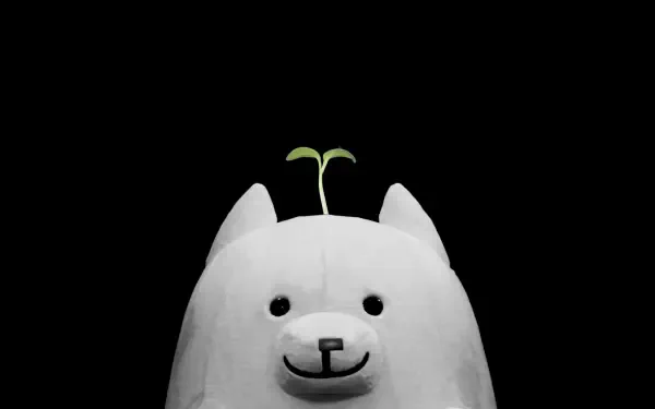 Deltarune-style white plush cat toy with a tiny sprout on its head, smiling stuffed animal on a black backdrop — 4K Ultra HD PC desktop wallpaper.