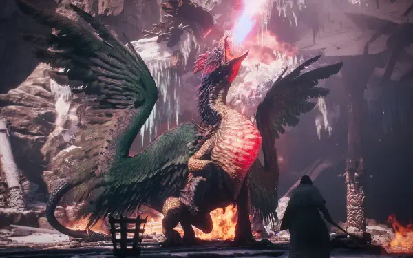 Dragon's Dogma 2 HD PC desktop wallpaper/background: a towering dragon with wings spread, roaring amid icy stalactites and fire in a cavern as a lone cloaked figure faces it.
