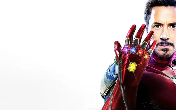 Avengers: Endgame 8K Ultra HD PC desktop wallpaper featuring Tony Stark in Iron Man armor raising a jeweled gauntlet against a white background.