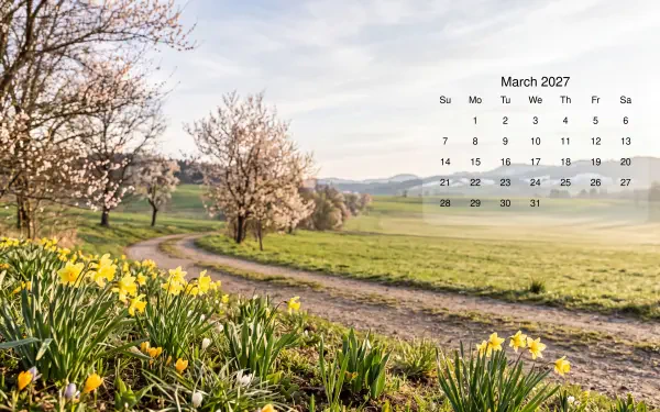 March 2027 calendar over a spring landscape of yellow daffodils and flowering trees, 5K Ultra HD desktop wallpaper