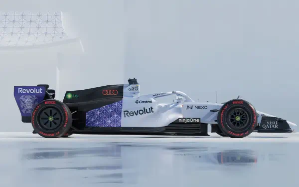 Audi R26 Formula One race car on an icy track, featured in a 4K Ultra HD PC desktop wallpaper background.