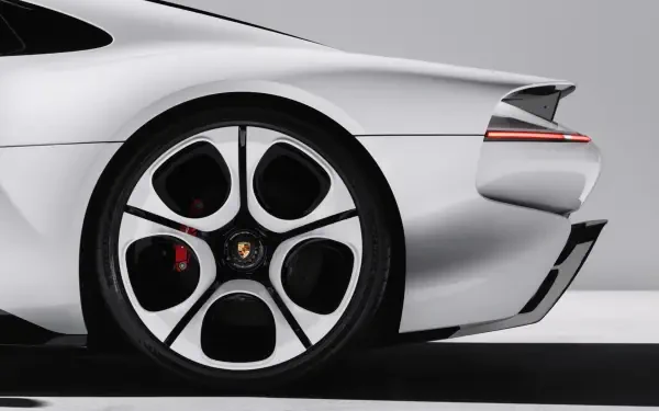 Porsche Mission S sports car rear wheel detail in a 2K Quad HD PC desktop wallpaper and background.