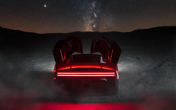 Tesla Roadster sports car with raised doors and glowing red taillights beneath a starry night sky, 2K Quad HD desktop wallpaper.