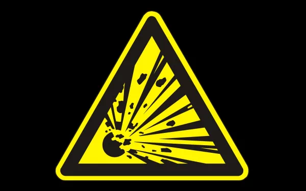 HD PC desktop wallpaper featuring a funny yellow warning sign with an explosion graphic on a black background.