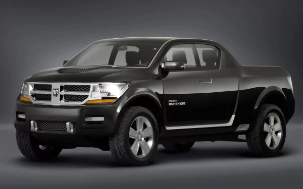 HD desktop wallpaper featuring a sleek black Dodge Rampage vehicle against a gray gradient background.