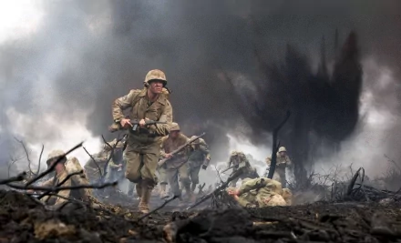 Dramatic 4K Ultra HD wallpaper from the TV show The Pacific (2010), depicting soldiers advancing through a smoky, war-torn battlefield.