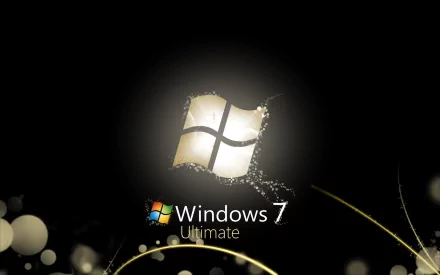 A sleek HD desktop wallpaper featuring the Windows logo and Windows 7 Ultimate text, set against a dark background with subtle light effects.