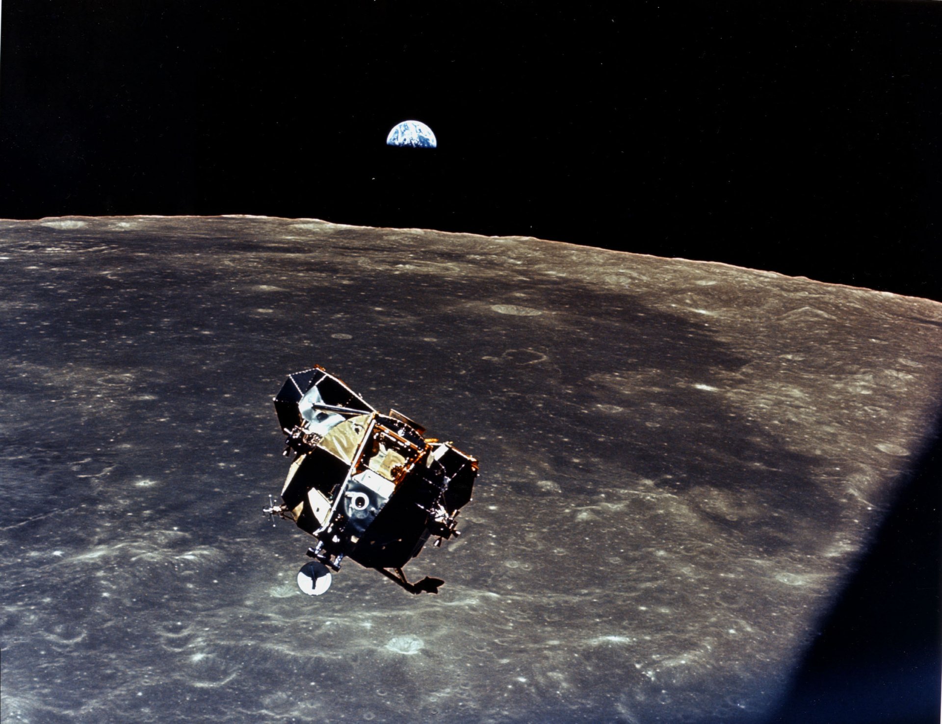 A stunning HD wallpaper featuring a NASA lunar module on the moon's surface, with Earth visible in the background, embodying the spirit of space exploration and Sci-Fi innovation.