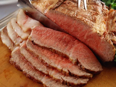 HD desktop wallpaper showing close-up details of succulent, sliced roasted meat. The juicy texture and rich color of the meat are vividly captured. Tagged with: food, meat.