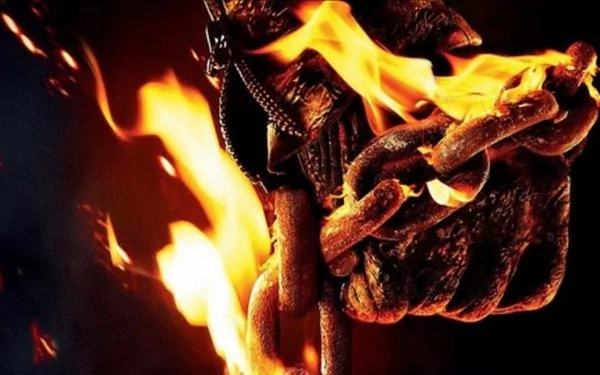 HD PC desktop wallpaper featuring a fiery close-up of Ghost Rider gripping a flaming chain from the movie Ghost Rider: Spirit of Vengeance.