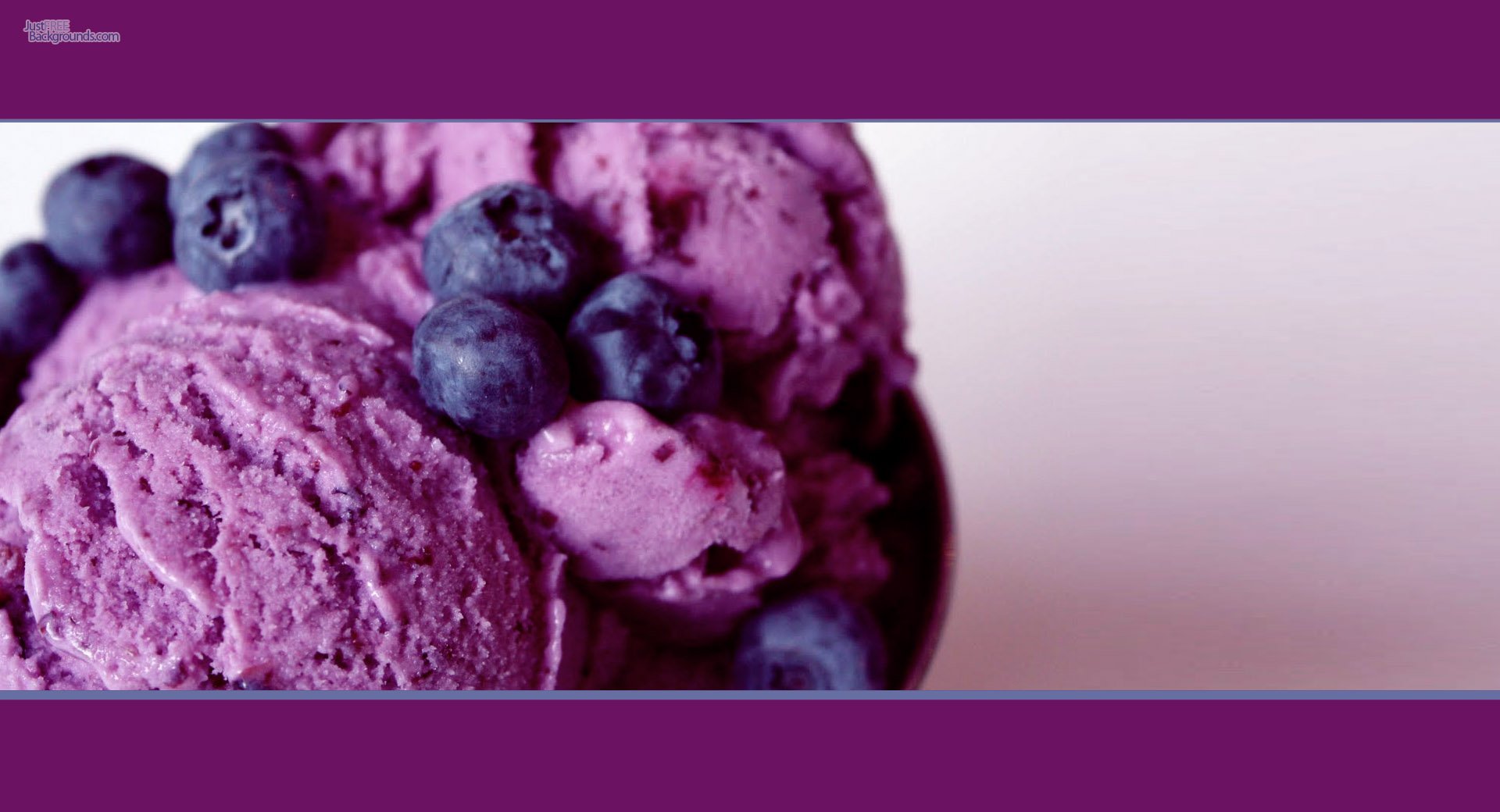 HD desktop wallpaper featuring close-up of vibrant purple ice cream scoops topped with fresh blueberries, highlighting delicious frozen dessert and fruit.