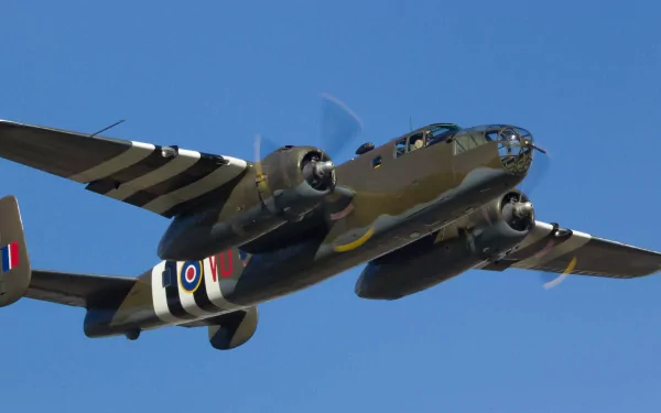 HD PC desktop wallpaper featuring a military aircraft flying against a clear blue sky.