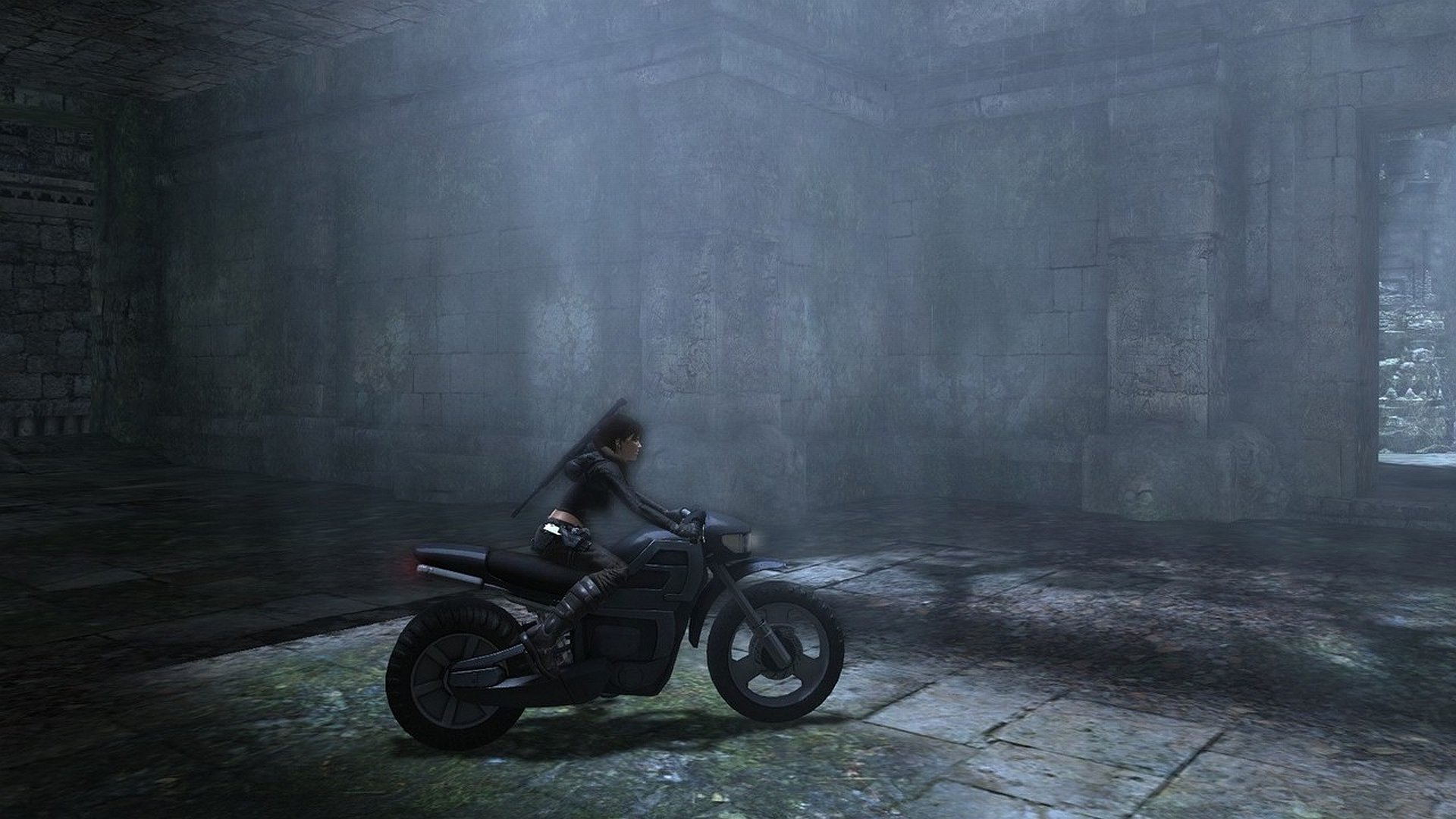 HD PC desktop wallpaper featuring a dark, atmospheric scene from the Tomb Raider video game, showing a character on a motorcycle inside a misty, ancient stone chamber.
