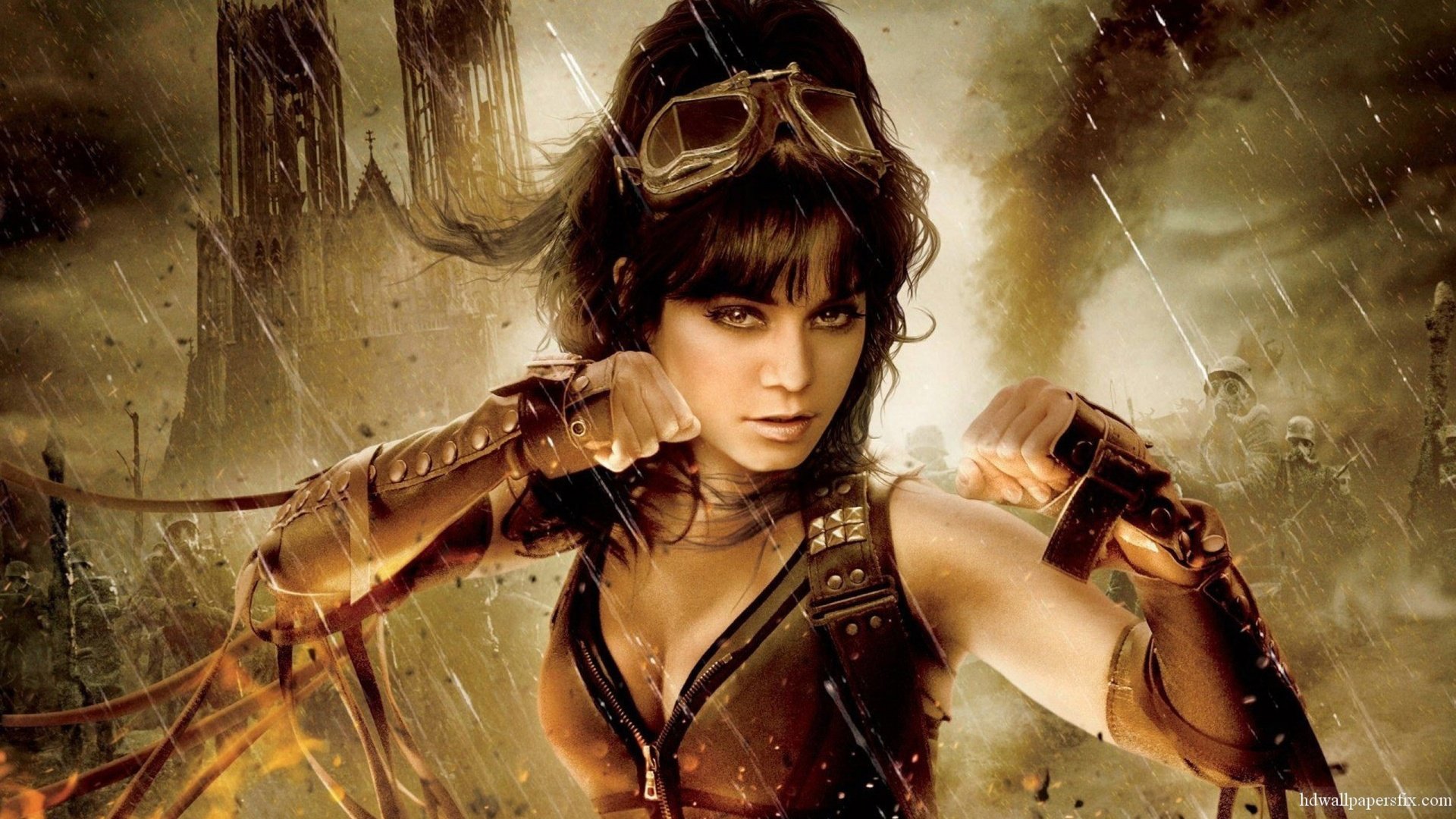 Vanessa Hudgens as a fierce character from the movie Sucker Punch in an intense action pose, featured in an HD PC desktop wallpaper background.