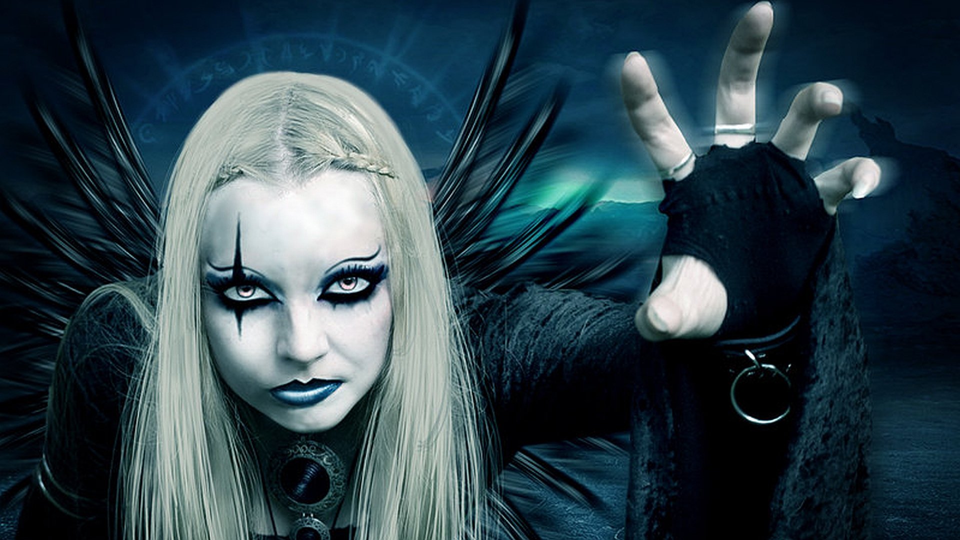 A fantasy-themed HD desktop wallpaper featuring a woman with striking makeup and dark wings, showcasing an intense expression and a mystical ambiance.