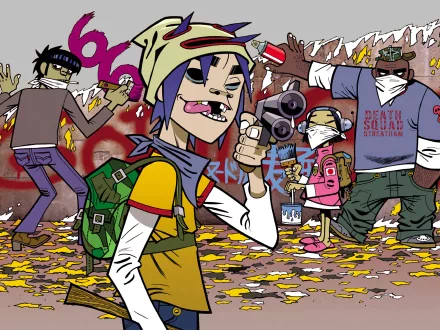 HD desktop wallpaper featuring colorful graffiti art inspired by the band Gorillaz, with animated characters in a chaotic urban setting, capturing the band's edgy music essence.