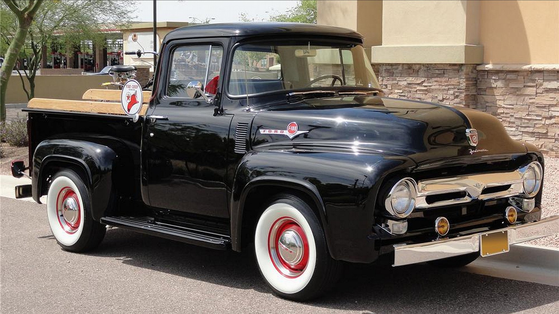 Black vintage Ford pickup truck with whitewall tires parked on a sunny street — 4K Ultra HD PC desktop wallpaper and background.