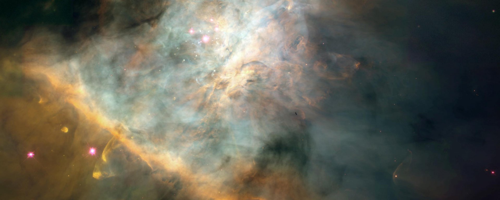 A vibrant nebula swirling with cosmic colors, showcasing the beauty of space in stunning HD quality. An enchanting Sci-Fi backdrop for any desktop wallpaper.