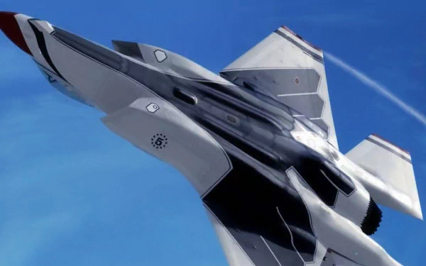 A Lockheed Martin F-35 Lightning II soars through a clear blue sky in this striking 4K Ultra HD wallpaper, showcasing its advanced design and military prowess.