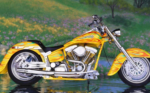 A vibrant Harley-Davidson motorcycle with yellow and orange flames, set against a lush green and floral background in this HD PC desktop wallpaper.