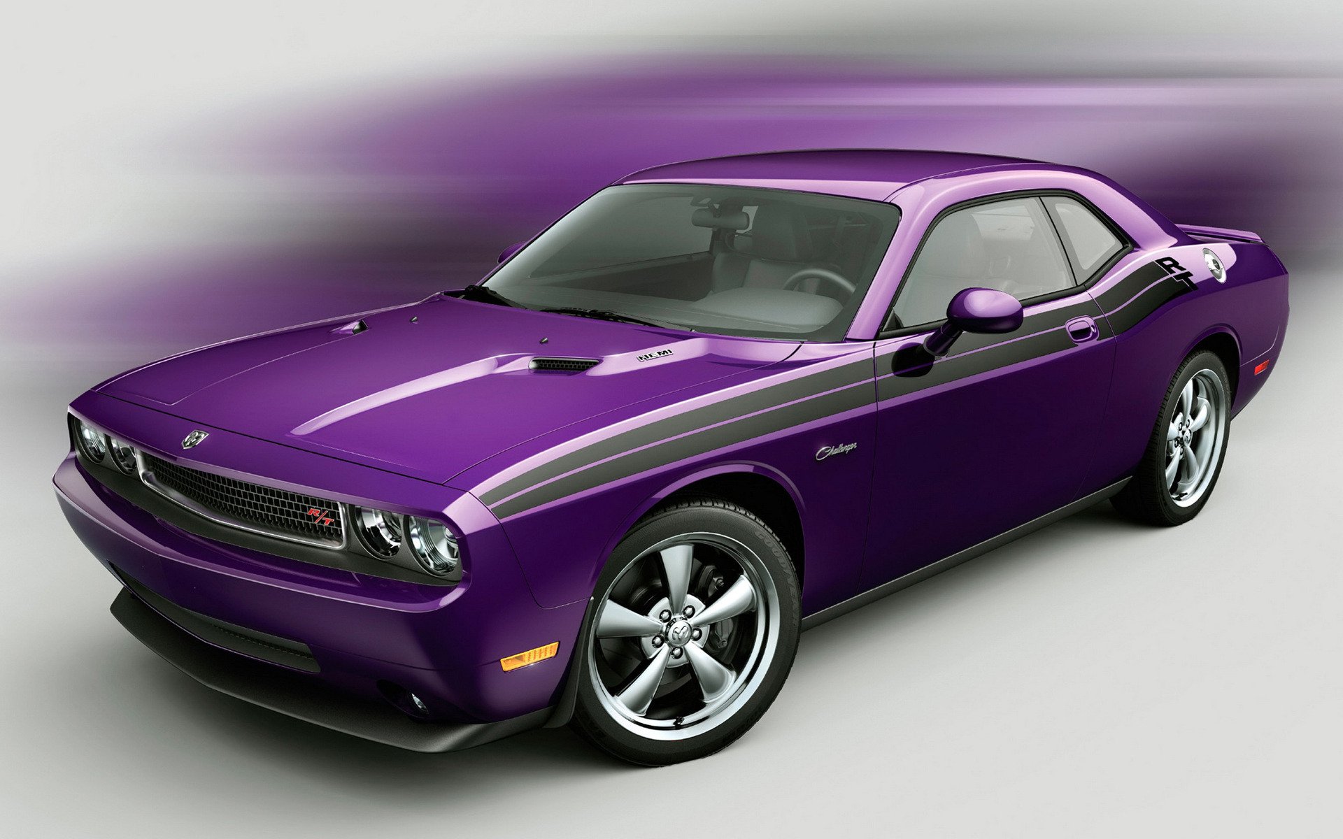 HD PC desktop wallpaper featuring a sleek purple Dodge muscle car with silver racing stripes, showcasing its bold design and polished finish.