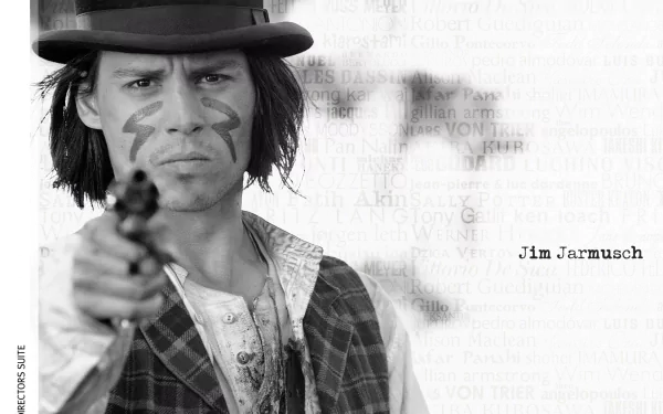 HD PC desktop wallpaper featuring Johnny Depp as the lead character in the movie Dead Man, styled in black and white with a textured background and director Jim Jarmusch's name.