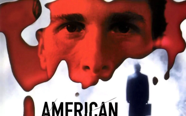 HD PC wallpaper featuring a close-up of a man's face drenched in red, with a blurred figure below, inspired by the movie American Psycho.