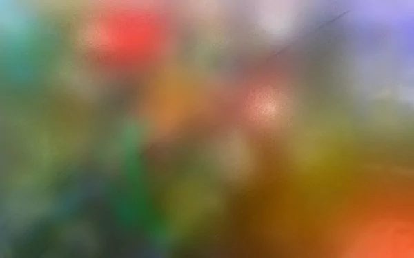 Abstract colorful blur of greens, reds, blues and orange forming a soft, painterly wash - 2K Quad HD PC desktop wallpaper/background.