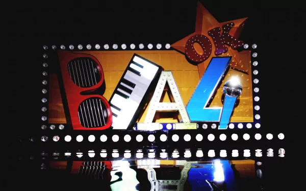 HD PC desktop wallpaper featuring a vibrant, illuminated sign spelling B1A4, showcasing the K-pop music group's logo and style.
