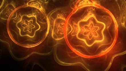 HD desktop wallpaper featuring glowing, abstract fractal shapes in warm orange and yellow tones, creating a dynamic and intricate visual pattern.