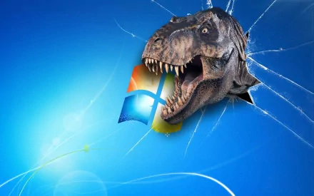 Artistic digital HD PC desktop wallpaper featuring a roaring T-Rex breaking through the Windows logo on a vibrant blue background.