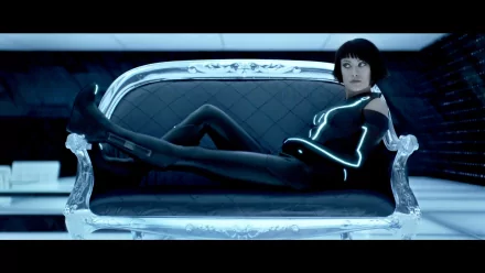 Olivia Wilde striking a pose in futuristic attire from the movie TRON: Legacy, featured as a high-definition PC desktop wallpaper and background.