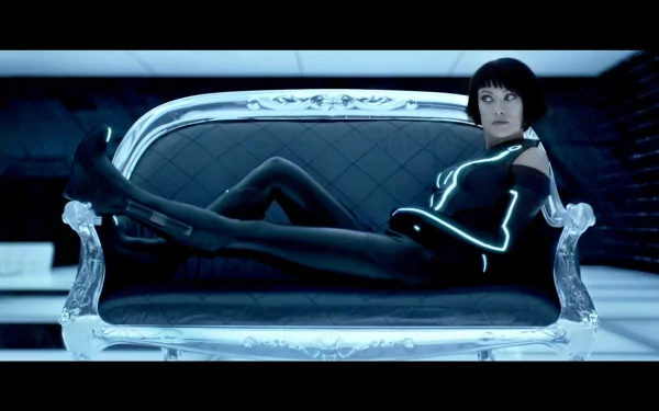 Olivia Wilde striking a pose in futuristic attire from the movie TRON: Legacy, featured as a high-definition PC desktop wallpaper and background.